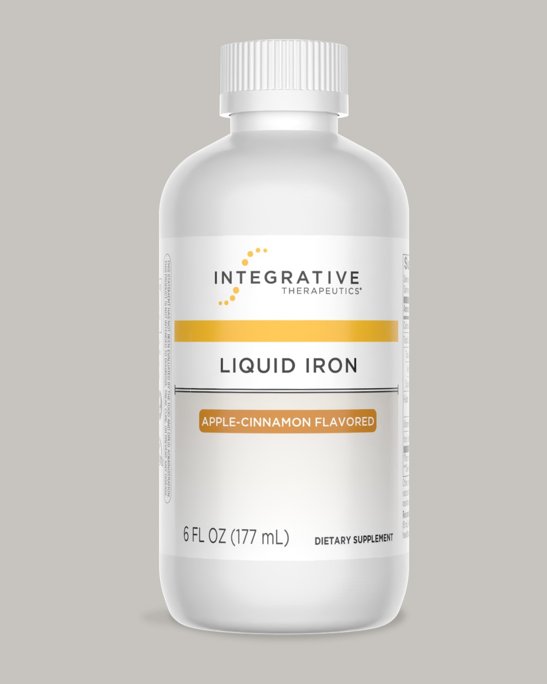 Integrative Therapeutics Liquid Iron bottle, apple-cinnamon flavored, 6 fl oz, on a soft warm-grey studio background